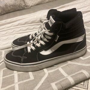 Vans ladies Black and White High-Top Sneakers